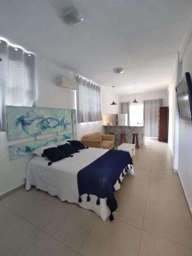 Ένα ή περισσότερα κρεβάτια σε δωμάτιο στο Studio Casa do Monge Ilhabela