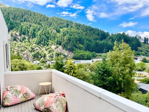 a balcony with a view of a mountain at Queenstown Retreat in Queenstown