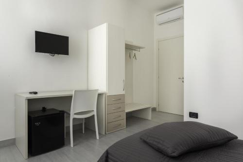 Televízia a/alebo spoločenská miestnosť v ubytovaní Easy Venice Rooms 1-2