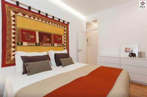 מיטה או מיטות בחדר ב-Design Duplex Apartment BA/ Chiado