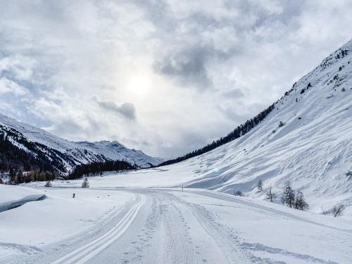 a snow covered mountain with a road on it at Alpenheim Simone in Sölden