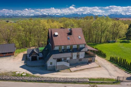 an overhead view of a house with a roof at Na Kamieńcu in Czarny Dunajec