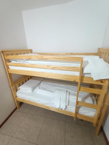 a pair of bunk beds in a room at Appartamenti Alpino in Baselga di Pinè