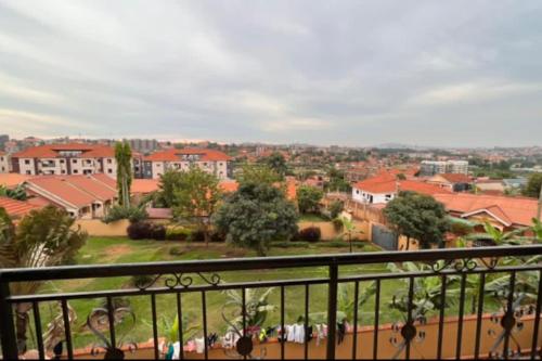 a view of a city from a balcony at The Matrix House in Kampala