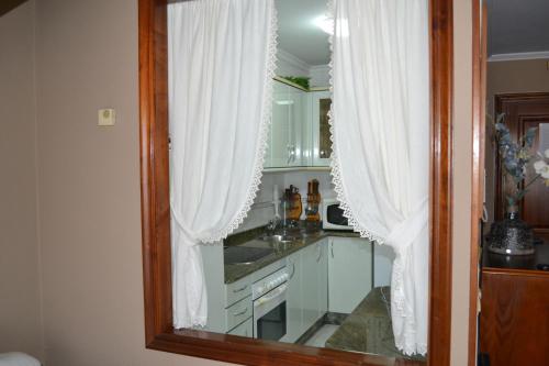 Kuchyň nebo kuchyňský kout v ubytování Coqueto Duplex en Vilagarcía de Arousa centro