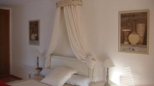 Ένα ή περισσότερα κρεβάτια σε δωμάτιο στο villa thierry
