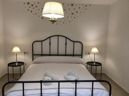 Postel nebo postele na pokoji v ubytování Apartamento Avenida