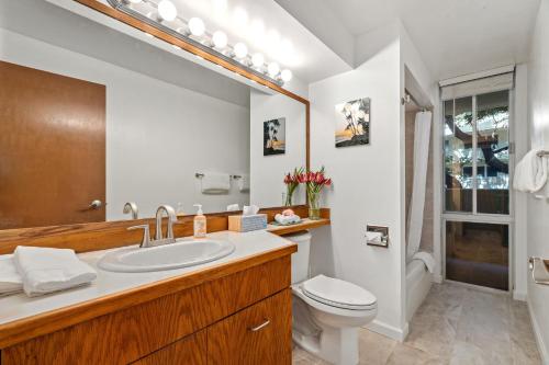 a bathroom with a sink and a toilet at @ Marbella Lane -Coastal retreat near Diamond Head in Honolulu