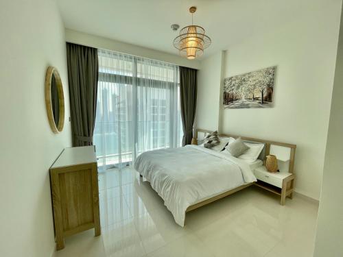 Postel nebo postele na pokoji v ubytování Dar Vacation - Magnificent City View 1BR Apartment