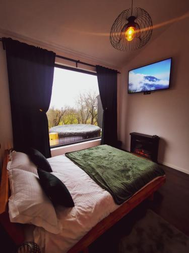 Postel nebo postele na pokoji v ubytování Campolongo Tiny Chalet