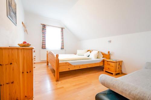 En eller flere senge i et værelse på Ahornhütte