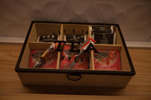 a box filled withiazepines and other items on a table at Apartman Iskra in Trebinje