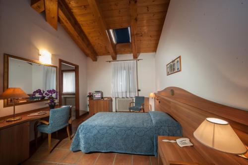 Кровать или кровати в номере La Vigneta