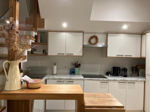 Η κουζίνα ή μικρή κουζίνα στο Luxury 3-Bedroom Townhouse in Hackney