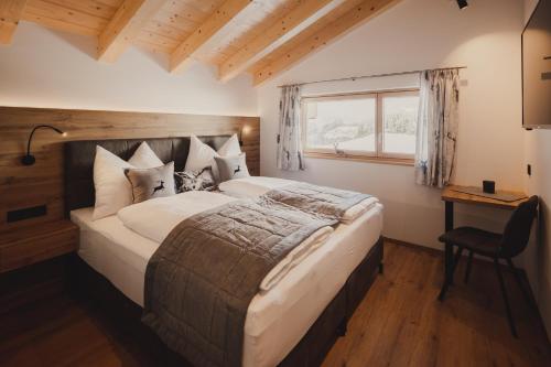 Posteľ alebo postele v izbe v ubytovaní Chalet Hochthron