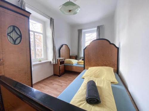 Postel nebo postele na pokoji v ubytování Stilvolle 2 Zimmer Wohnung mit Küche, TV, Waschmaschine