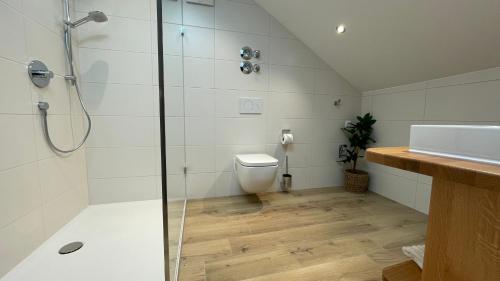 Ένα μπάνιο στο Ferienwohnung BGD