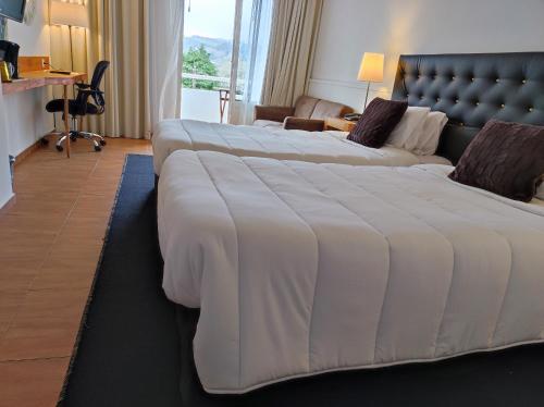 Кровать или кровати в номере Vista Do Vale