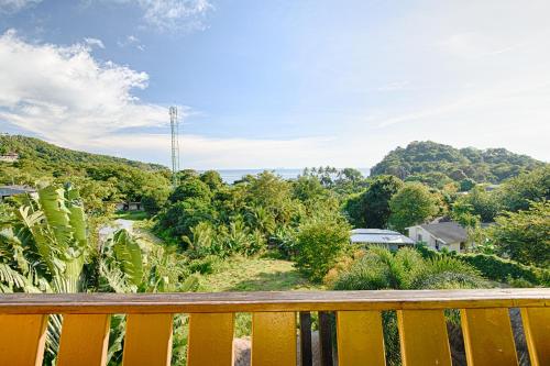 a view from the balcony of a house at Villa Siam Lanna at Kantiang Bay in Ko Lanta