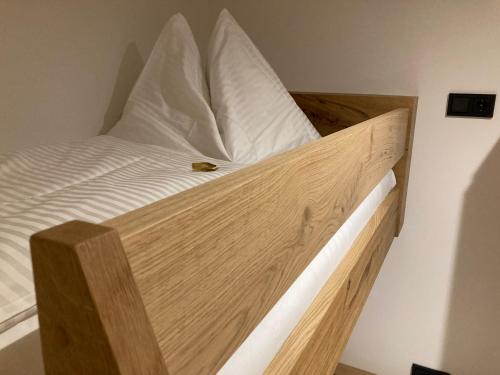 Ein Bett oder Betten in einem Zimmer der Unterkunft das MARX - Gasthof Marx - Apartments