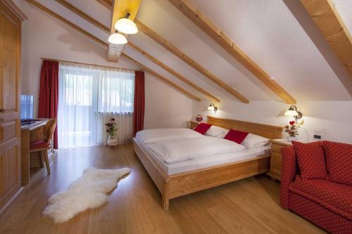 Postel nebo postele na pokoji v ubytování Residence Merk