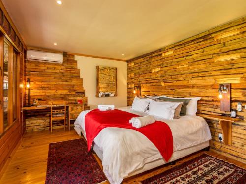 Postel nebo postele na pokoji v ubytování The Log Cabin Lodge