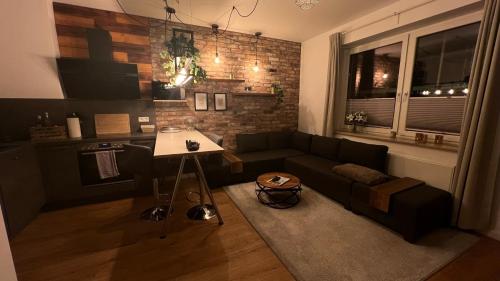 Posezení v ubytování Sanierte Wohnung mit Balkon im Hochparterre