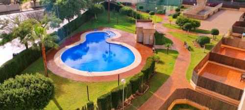 Apartamento TomCar Piscina, Pádel, wifi y zonas comunes