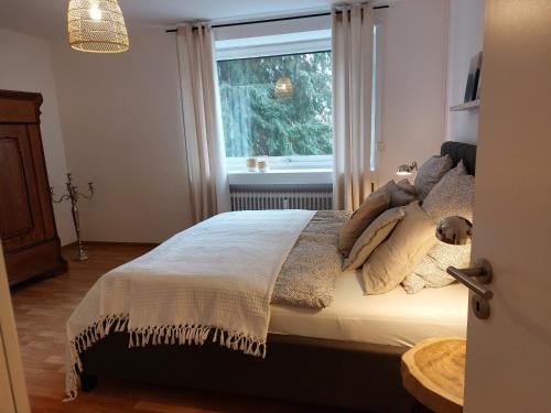 Giường trong phòng chung tại Ferienwohnung Wiesengrund 2