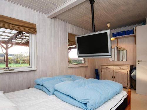 Postel nebo postele na pokoji v ubytování Holiday home Knebel LIX