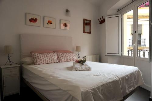 A bed or beds in a room at Casa Marcur Santa Cruz