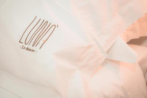 a white shirt with a fork on it at Lunà - Le Dimore - in Canosa di Puglia