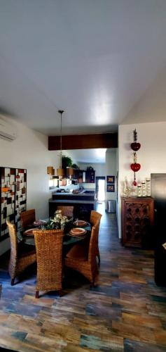 a kitchen and dining room with a table and chairs at Casa Emiliana in Valle de Guadalupe