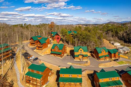 an aerial view of a resort village with a road at 5Bd5B Escape Cabin with 2 HotTubs, Thtr &Game Rm,1mi to the Parkway! 4mi to Dollywood - Spring Deal in Pigeon Forge