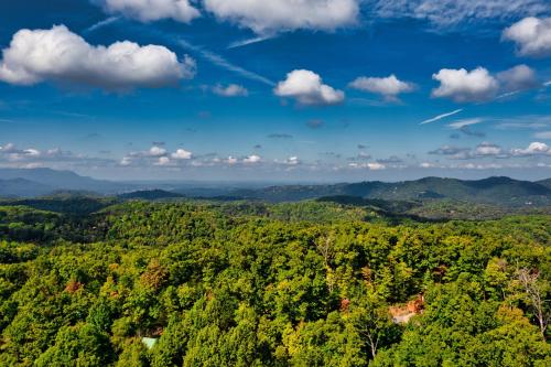 an aerial view of a forest in the mountains at 5Bd5B Escape Cabin with 2 HotTubs, Thtr &Game Rm,1mi to the Parkway! 4mi to Dollywood - Spring Deal in Pigeon Forge