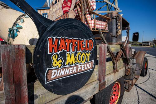 a sign for a harifted and meory dinner truck at 5Bd5B Escape Cabin with 2 HotTubs, Thtr &Game Rm,1mi to the Parkway! 4mi to Dollywood - Spring Deal in Pigeon Forge