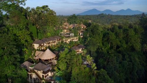 an aerial view of a resort in the jungle at Jannata Resort and Spa in Ubud