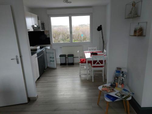 Kuchyň nebo kuchyňský kout v ubytování La détente 2 etoiles