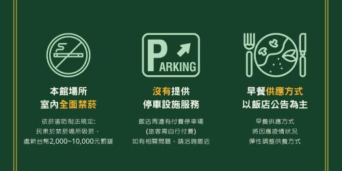 a set of signs for parking and a plate of food at Green World Hotel - Zhonghua in Taipei