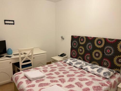 Ένα ή περισσότερα κρεβάτια σε δωμάτιο στο Domina the lovely