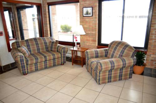 Χώρος καθιστικού στο Baymont by Wyndham Port Huron