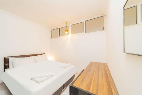 Postel nebo postele na pokoji v ubytování Cozy Flat Close to Duden Waterfalls in Antalya