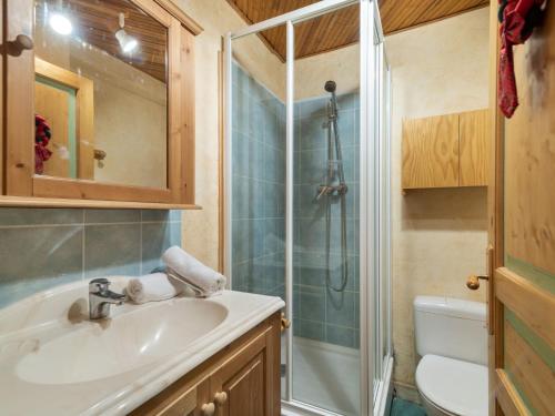 a bathroom with a sink and a shower at Apartment Le 2100 A et B-1 in Tignes