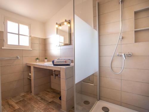 a bathroom with a shower and a sink at Holiday Home Les Troenes by Interhome in Fréjus