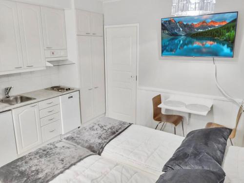 Køkken eller tekøkken på Holiday Home Levin tuisku by Interhome