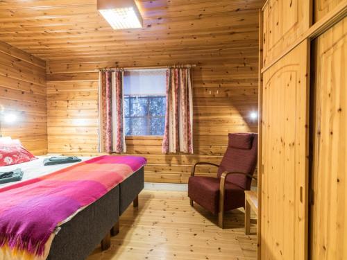 En eller flere senge i et værelse på Holiday Home Elmeri by Interhome