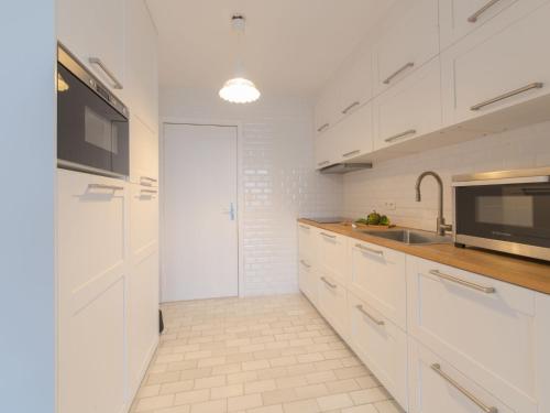 Kuchyň nebo kuchyňský kout v ubytování Apartment Seaview 2 by Interhome