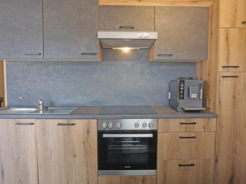 A kitchen or kitchenette at Apartment Apart Handle by Interhome