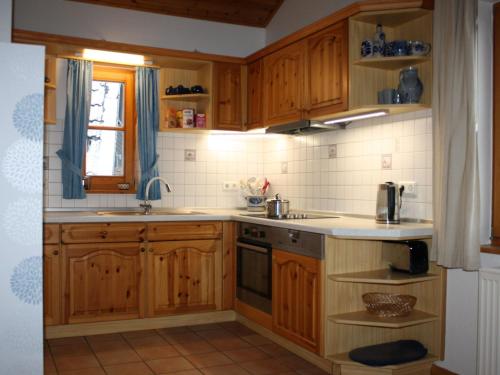 Dapur atau dapur kecil di Holiday Home Ferienhaus Bude 87 by Interhome