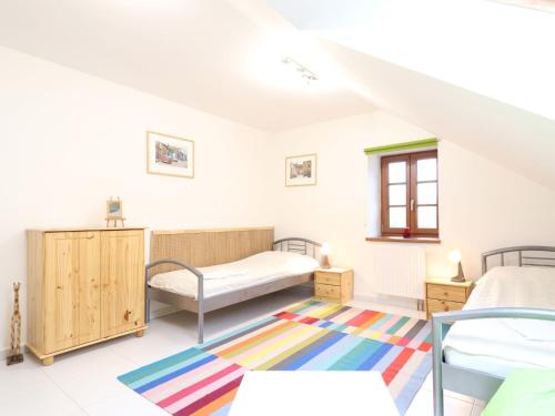 Кровать или кровати в номере Holiday Home Posázaví by Interhome